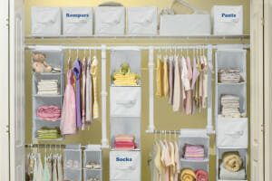 A multi-layered child's closet organizer for hanging clothes, shoes, towels and bedding, and soft sided baskets for more.