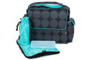 A diaper bag in black with gray circles, and matching turquoise bottle tote, changing pad and accessory.