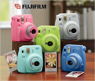 Fujifilm Instax Cameras with instant film in pink, gray, green, light blue and dark blue colors.
