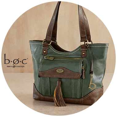 A woman's handbag in mossy green with brown trim sporting a front pocket and tassel.